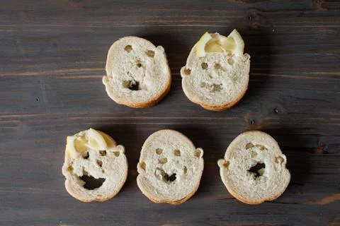 Faces from bread Stock Photos
