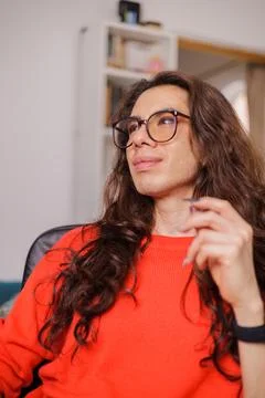 Faces of non-binary people with thoughtful and positive expressions Stock Photos