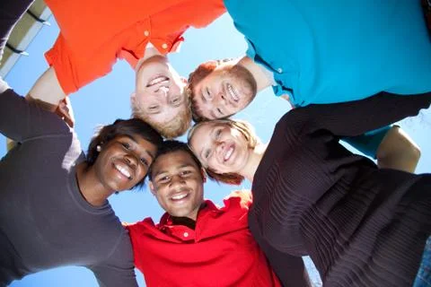 Faces of smiling multi-racial college students Stock Photos