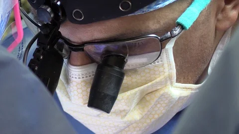 Faces of the surgeons in operation Stock Footage 85940744