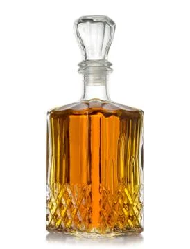 Faceted bottle of cognac on white background Stock Photos