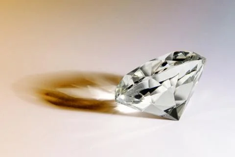 Faceted diamond with shadow Stock Photos