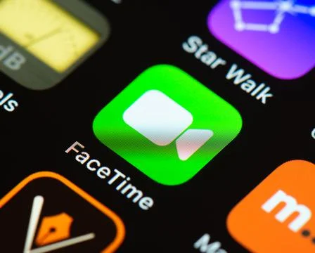 FaceTime app icon on Apple iPhone screen Stockfoto's