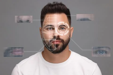 Facial and iris recognition system. Man undergoing biometric verification o.. Stock Photos