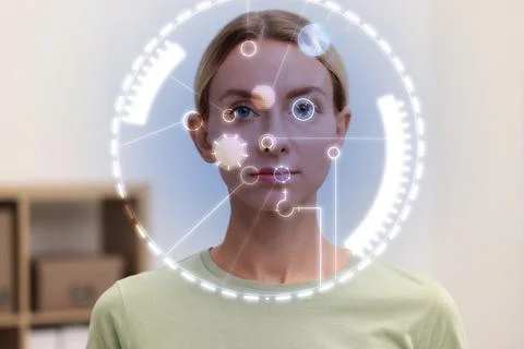 Facial and iris recognition system. Woman undergoing biometric verification.. Stock Photos