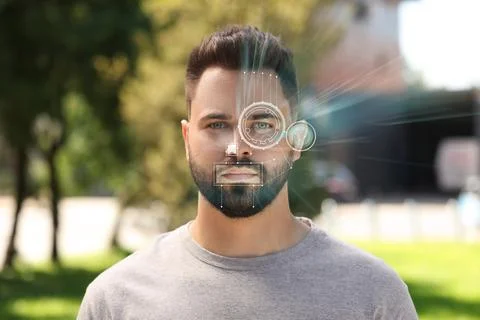Facial and iris recognition system. Man undergoing biometric verification o.. Stock Photos