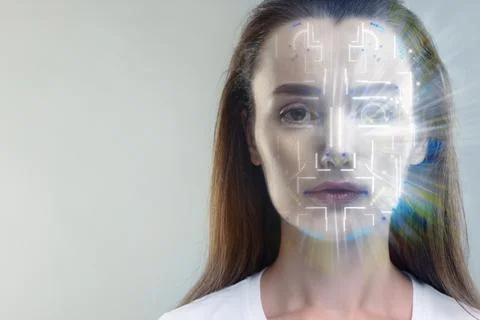 Facial and iris recognition system. Woman undergoing biometric verification.. Stock Photos