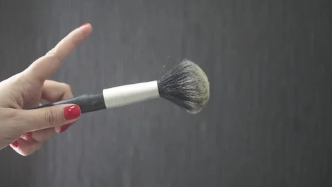 Facial base makeup and brush performing actions before applying. Stock Footage 137677164