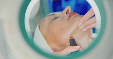 Facial Cosmetic Procedure in a Spa Setting Stock Footage 323611402