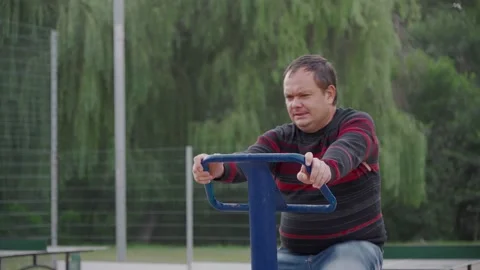 The facial expression of a man who diligently plays sports Stock Footage 158970675