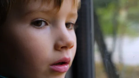 Facial expression that shows absolute interest of what is going on out of the Stock Footage 121851779