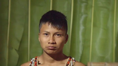 Facial expression of a young boy pouting in ecuador Stock Footage 113180718