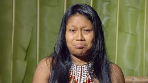 Facial expression of a young girl pouting in ecuador Video stock 113181475