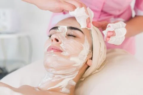 Facial mask removing Stock Photos