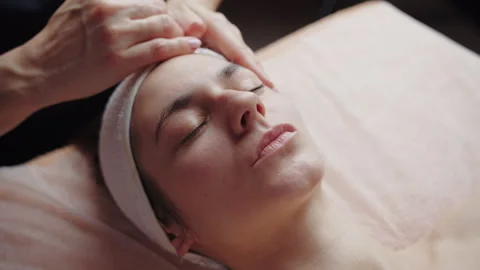 Facial massage therapy session in spa center Stock Footage 305665747