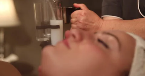 Facial Mist Rack Focus Low Angle Close Up Stock Footage 57752316