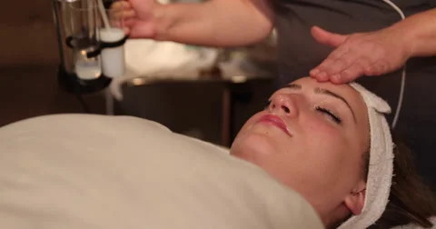 Facial Misting of Spa Client Move Right Stock Footage 62780619