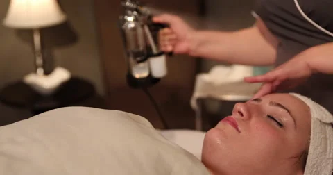 Facial Misting of Spa Client Move Left Stock Footage 62781234