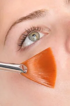 Facial peeling mask applying Stock Photos