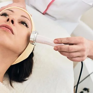 Facial peeling procedure Stock Photos