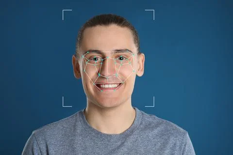 Facial recognition system. Man with scanner frame and digital biometric grid  Stock Photos