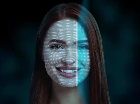 Facial recognition system. Scanning woman's face for authentication Foto stock