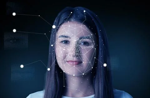 Facial recognition system. Scanning woman's face for authentication Foto stock