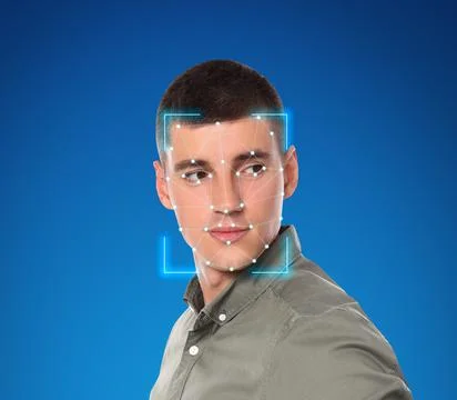 Facial recognition system. Young man with scanner frame and digital biometric Stock Photos