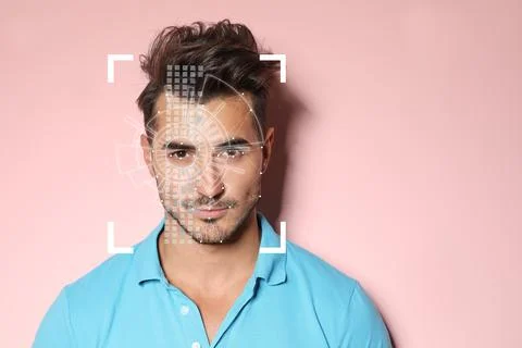 Facial recognition system. Young man with scanner frame and digital biometric Foto stock