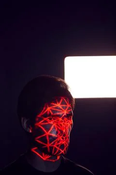 Facial Recognition Technology Concept As Man Has Red Grid Projected Onto Face In Stock Photos