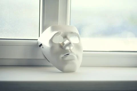Facial sheet white mask on window background Stock Photos