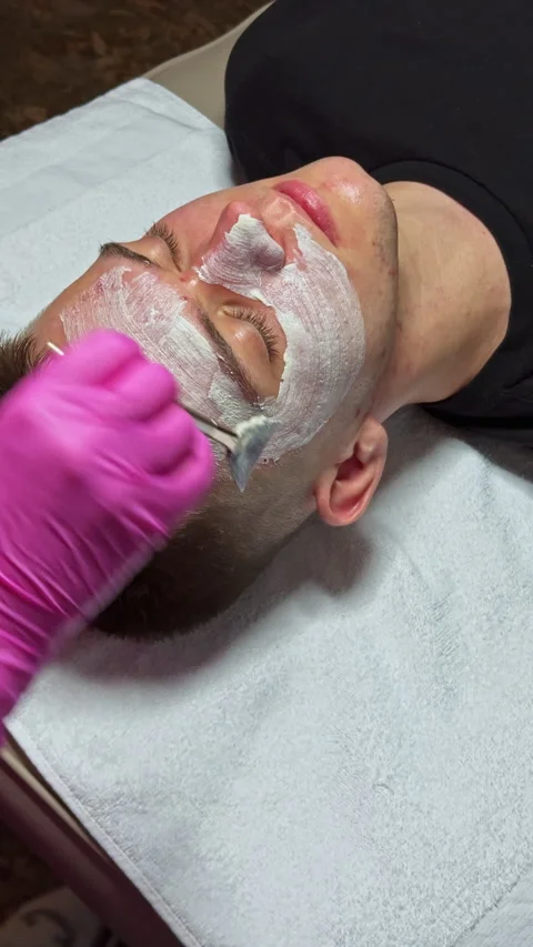 Facial treatment session taking place in a skincare studio during daylight hours Stock Footage 332084929