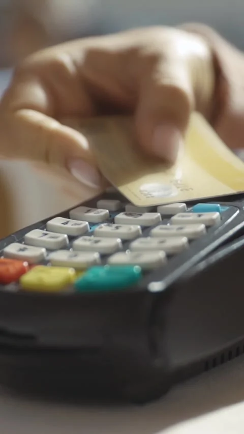 Facilitating a Contactless Payment Transaction Using a Card Reader Device for Stock Footage 305980341