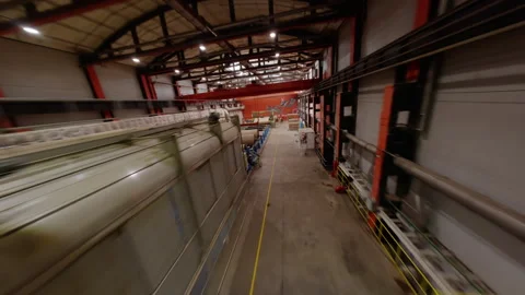 Facility encompasses automated systems with machinery FPV Stock Footage 291336950