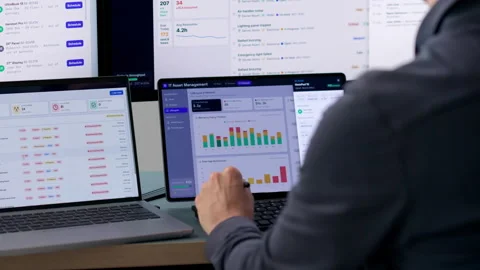 Facility Manager Tracking Maintenance Requests On Laptop Stock Footage 339890205