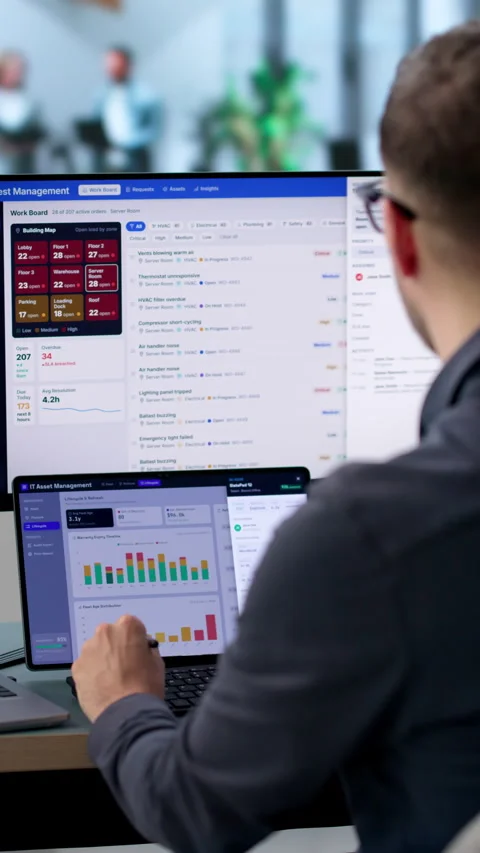 Facility Manager Tracking Maintenance Requests On Laptop Stock Footage 340399022