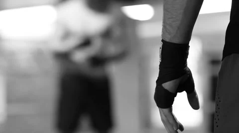 Facing challenge. Black and white shot of two professional fighters facing ea Stock-Footage 58556318
