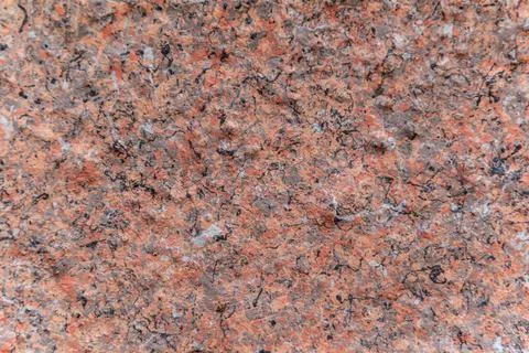 Facing material horizontal background. A red granite slab in close-up can be Stock Photos