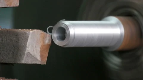 Facing operation of a metal blank on turning machine with cutting tool. Stock Footage 87725523