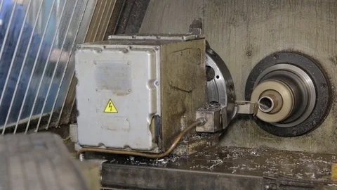 Facing operation of a metal blank on turning machine with cutting tool Stock Footage 109338765