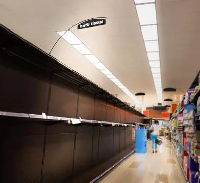 Facing Shortages While Shopping During an Epidemic for Toilet Paper and Supplies Foto stock
