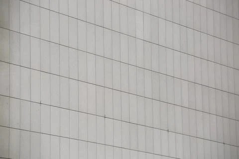 Facing stone on the facade of a building Stock Photos