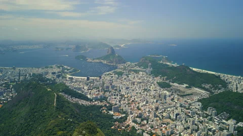 Facing Sugarloaf Mountain, Pull Back To Reveal Christ the Redeemer, 4k Stock Footage 240043679
