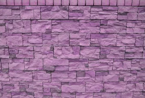 Facing tile stone wall texture pink background 스톡 사진