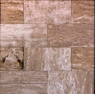 Facing tile from travertine with a smooth surface Stock Photos