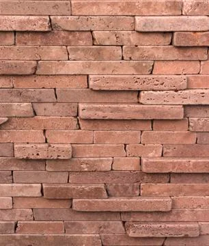 Facing tile from travertine with a smooth surface Stock Photos