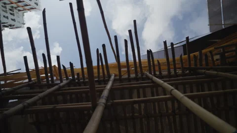 Facing upward panning shot of a construction site in bamboo in Hong Kong Stock Footage 247616024