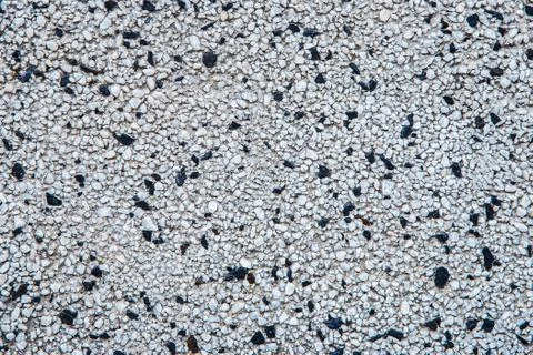 The facing of the wall is made of small pieces of stones Stock Photos