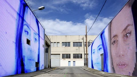 Factory and industrial complex with passing clouds and fae scan woman Stock Footage 316625430