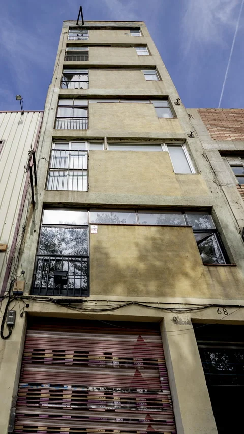 Factory and industrial complex with passing clouds in vertical Stock Footage 317023629